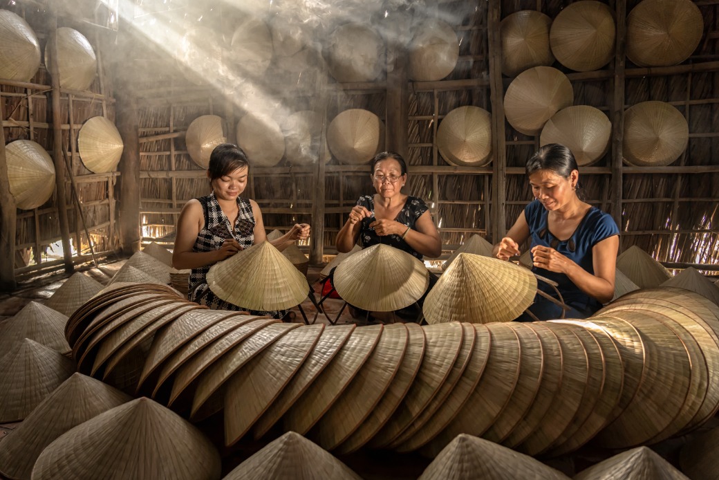 group-of-vietnamese-female-craftsman-making-the-tr-2022-02-01-22-36-51-utc.jpg