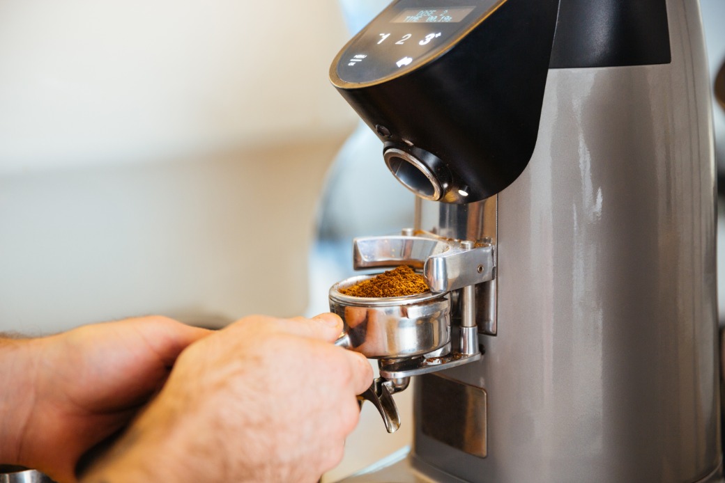 barista-grinding-coffee-2021-08-26-18-19-37-utc.JPG